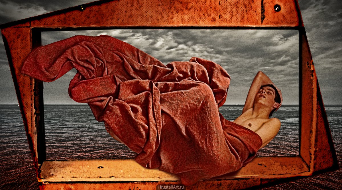 Фотография, парень наполовину укрытый красной тканью спит в экспресивной позе.